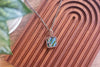 Striped Blue and Green Fused Glass Pendant with Copper Wire Wrapping