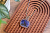 Copper Wire Wrapped Pendant with Wolf and Moon on Streaked Blue Glass