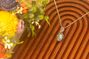 Sterling Silver Teardrop Pendant with Dichroic Blue Fused Glass