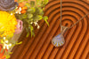 Swirled Blue and Brown Fused Glass and Copper Wire Statement Pendant