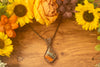 Streaked Orange and Blue Fused Glass and Copper Wire Statement Pendant