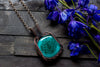 Copper Wire Wrapped Pendant with Stylized Flowers on Teal Fused Glass