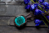 Copper Wire Wrapped Pendant with Stylized Flowers on Teal Fused Glass