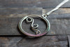 Circular Sterling Silver Wire Wrapped Pendant