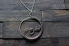 Circular Sterling Silver Wire Wrapped Pendant