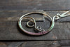 Circular Sterling Silver Wire Wrapped Pendant