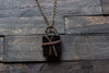 Black and Streaked Blue Glass Pendant with Copper Wire Wrapping