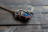 Black and Streaked Blue Glass Pendant with Copper Wire Wrapping
