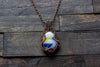Streaked Blue, Yellow and White Fused Glass Pendant with Copper Wire Wrapping