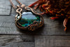 Copper pendant with green fused glass
