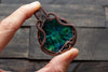 Copper pendant with green fused glass