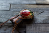 Copper pendant with red, green and white fused glass