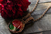 Copper pendant with red, green and white fused glass