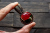 Copper pendant with red, green and white fused glass