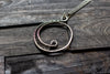Circular Sterling Silver Wire Wrapped Pendant