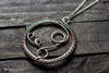Circular Sterling Silver Wire Wrapped Pendant