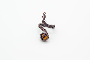 handmade copper wire wrapped adjustable ring with transparent amber fused glass accent