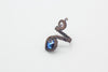 handmade copper wire wrapped adjustable ring with bright blue fused glass accent