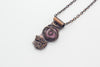 handmade copper bar necklace with pink fused glass and wire wrapping