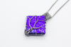 handmade sterling silver tree of life pendant with bright blue fused glass