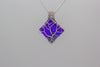 handmade sterling silver tree of life pendant with bright blue fused glass