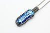 handmade pendant with bright blue fused glass and sterling silver wire wrapping