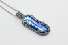handmade pendant with bright blue fused glass and sterling silver wire wrapping