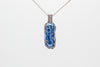 handmade pendant with bright blue fused glass and sterling silver wire wrapping