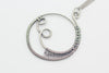 handmade circular pendant with sterling silver wire wrapping