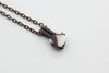 Small handmade pendant with blue and white fused glass and copper wire wrapping