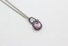 handmade small pendant with pink fused glass and sterling silver wire wrapping