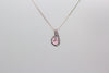 handmade small pendant with pink fused glass and sterling silver wire wrapping