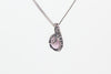 handmade small pendant with pink fused glass and sterling silver wire wrapping