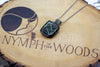 handmade dichroic green fused glass and sterling silver wire wrapped pendant