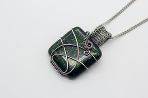 handmade dichroic green fused glass and sterling silver wire wrapped pendant