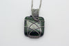 handmade dichroic green fused glass and sterling silver wire wrapped pendant