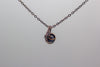 Handmade pendant with dark blue dichroic fused glass and copper wire wrapping