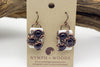 Handmade earrings with dark purple and white fused glass and copper wire wrapping