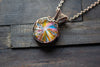 Swirl of Sunrise Fused Glass and Copper Wire Pendant