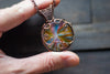 Swirl of Sunrise Fused Glass and Copper Wire Pendant