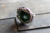 sterling silver statement ring with glittery green dichroic fused glass