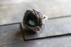 sterling silver statement ring with glittery green dichroic fused glass