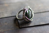 sterling silver statement ring with glittery green dichroic fused glass
