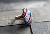 Copper statement ring with blue and grey fused glass