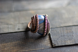 Copper statement ring with blue and grey fused glass