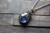 Transparent Streaked Blue Fused Glass Pendant with Copper Wire Wrapping