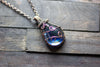 Transparent Streaked Blue Fused Glass Pendant with Copper Wire Wrapping