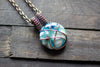 Copper Crisscross Pendant with Light Blue and White Fused Glass