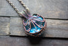 Streaked Blue Transparent Fused Glass Pendant with Copper Wire Wrapping