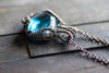 Streaked Blue Transparent Fused Glass Pendant with Copper Wire Wrapping